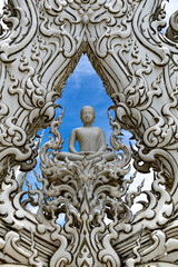 Buddha bianco seduto con fiamme bianche Wat Rong Khun Chiang Rai