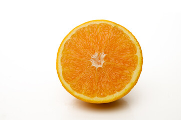 half orange fruit and slice isolated, Orange fruit macro studio photo