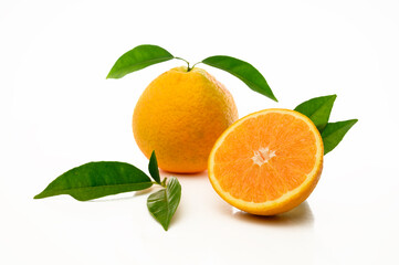 Fresh oranges with half isolated on white background