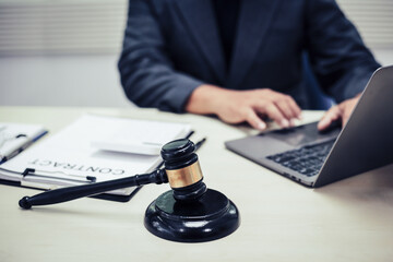 Two lawyers consult in a modern office, presenting compelling arguments and demonstrating their expertise, trying to win a case with their legal acumen and persuasive skills.
