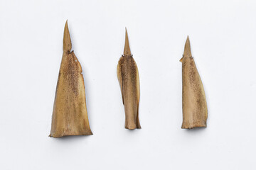 Dried bamboo stem leaves, dry leaves isolated on white