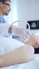 Doctor man wearing white protective gloves is using ultrasound machine to examine neck of female patient in hospital. Medicine, thyroid gland health