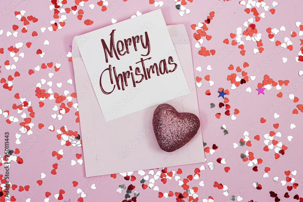 Wall mural merry christmas card with pink envelope and heart confetti, holiday concept