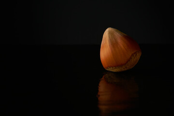 hazelnut on black table