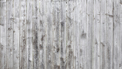Obraz premium Close-Up of Weathered Gray Wooden Fence Texture