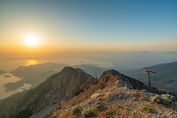 Babadag mountaintop landscape at sunset overlooking Oludeniz beach in Fethiye, Turkey