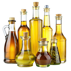 A group of eight glass bottles containing different types of cooking oil are arranged on a white background