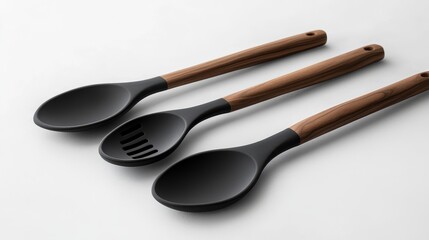 Utensil set for the kitchen featuring a black silicone construction and elegant wooden handles. Includes a spatula, spoon, and ladle.