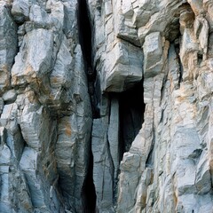 Fototapeta premium Natural rock formation showing dramatic geological features in daylight