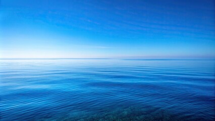 Fototapeta premium Empty Mediterranean sea with a serene reflection of the clear blue sky, water, natural, scenery, stillness, ocean, beauty, blue sky, clear,calm, serene, peaceful, reflection, horizon