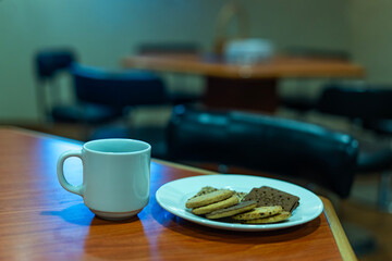 Coffee and different types of cookies.