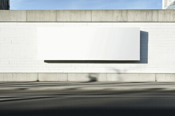 Obraz premium Modern Urban Street Scene with Passersby in Motion Blur and Blank White Brick Wall Billboard Mockup - Daylight, Industrial Setting