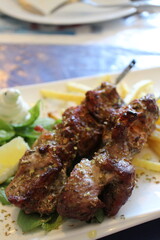 Greek cuisine: pork souvlaki (grilled pork)