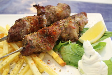Greek cuisine: pork souvlaki (grilled pork)