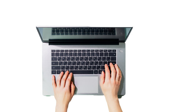 Isolated woman's hands working on laptop on transparent background. Office desktop. Concept of Working, communication, dating and online order on laptop. Flat lay