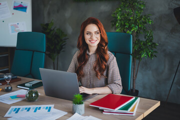Photo of smiling positive lady boss formalwear working modern device indoors workplace workstation...