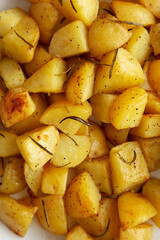 Homemade Oven Roasted Potatoes on a Plate, top view. Flat lay, overhead, from above.