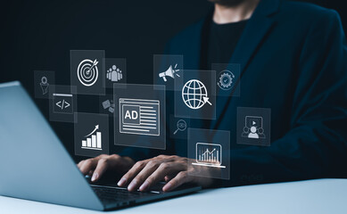 Digital Marketing Concept. Businessman working on laptop with digital marketing icons online...