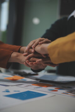 Hand join together for work togetherness, Hand stack for business and service, Team volunteering or teamwork. Concept connection of community and charity. Group of business workforce participation.