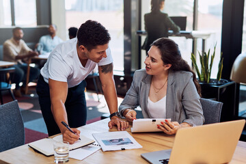 Meeting, people and writing in cafe for business plan, brainstorming and information for growth. Man, woman or notebook at tech for discussion, startup idea or research files for industry development