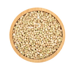 Green buckwheat in a wooden bowl ,top view