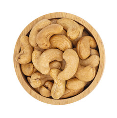Roasted cashews in wooden bowl ,top view
