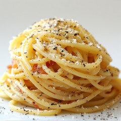 A pile of cooked pasta with seasonings.