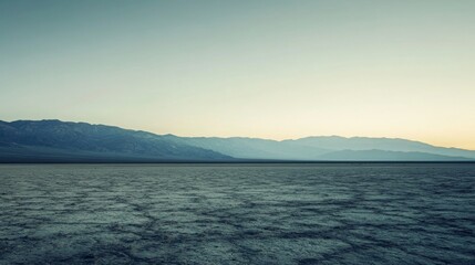 Fototapeta premium Mountain Range Reflection in Dry Lakebed