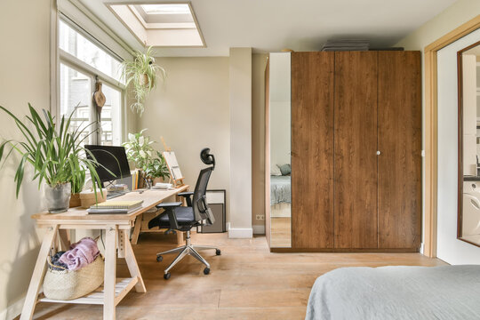 Home office with natural light and plants