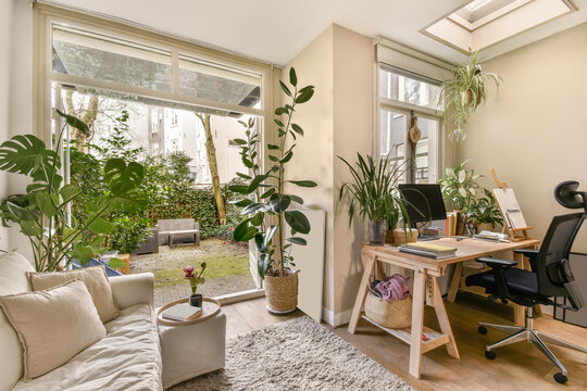 Cozy home office with garden view and natural light