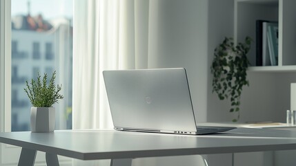 Fototapeta premium white laptop on a sleek desk in a modern office