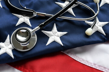 United States America healthcare medical concept - stethoscope on American flag