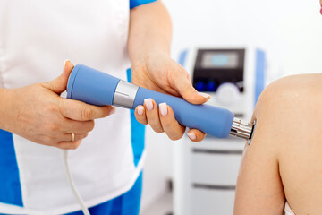 Non-invasive Shockwave Therapy (ESWT) for neck and back muscles. Promotes pain relief, muscle recovery, and spinal health. Highlights advanced physiotherapy techniques.