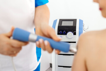 Non-invasive Shockwave Therapy (ESWT) for neck and back muscles. Promotes pain relief, muscle recovery, and spinal health. Highlights advanced physiotherapy techniques.