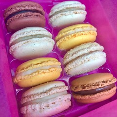 colorful macaroons on a wooden table