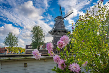 Dutch windmill De Gooyer in Amsterdam in the summer, National Monument and the tallest wooden mill...