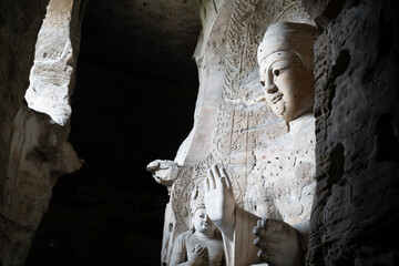 giant stone buddha in Yungang Grottoes in Datong, China