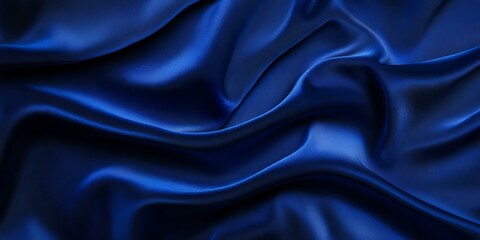 Fototapeta premium Smooth, flowing, blue fabric.