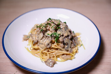 Mushroom spaghetti pasta and white cream sauce
