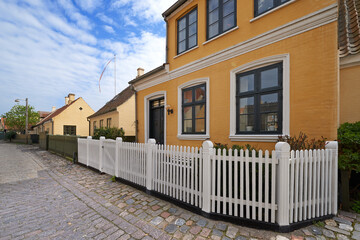 Village, house and street with heritage, architecture in traditional, cultural and retro town as tourist attraction in Germany. Home, vintage and alley in countryside, neighborhood or community
