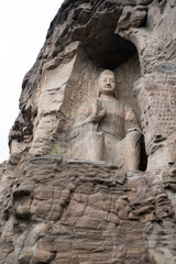 great stone buddhas in Yungang grottoes in Datong,  China