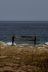 old bench on the seashore