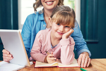 Education, portrait of daughter with mother and tablet in dining room of apartment for distance learning. Homeschool, notebook and smile of girl child with parent for development, growth or study