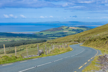 an empty road in the mountains