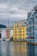 Historic storage buildings in the city center of Ålesund, Norway with their colourful facades.