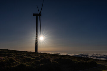 Obraz premium The sun as the protagonist of the sunset in the mountains of Asturias, Spain, on a summer day!