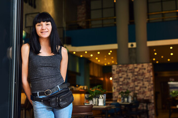 Small business, entrance or portrait of happy woman at restaurant as female bartender in service...