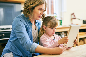 Education, reading on tablet and mother with daughter in dining room of apartment for distance...