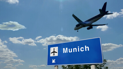 Plane landing in Munich Germany airport with signboard