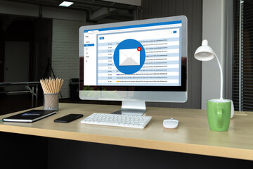 Email notification message showing on computer screen snugly. Digital marketing message information text from business to customer client